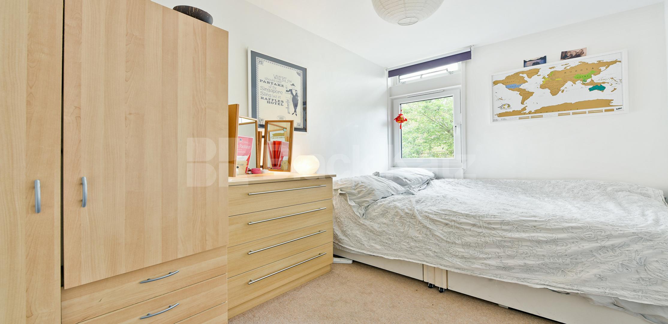 Arranged over two floors with tranquil garden Cedars Road, Clapham Common North Side